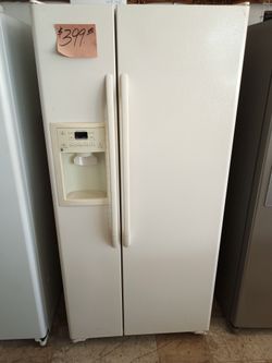 GE Side by Side Refrigerator ex large excellent . Warranty . Delivery available . 2203 Fowler st. Ft. Myers 33901