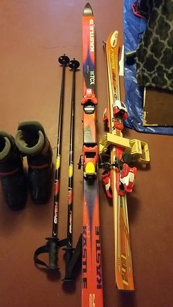 2 pairs of ski's. 1 is kastle and 1 is volkl. Ski poles and boots