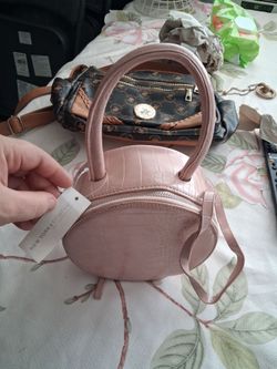 New York and company pink round purse used