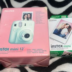 Instamax mini 12 Polaroid with film/ Cannon EOS 400D with lens