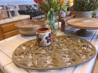 Medium size cast iron trivet. No other items are for sale.