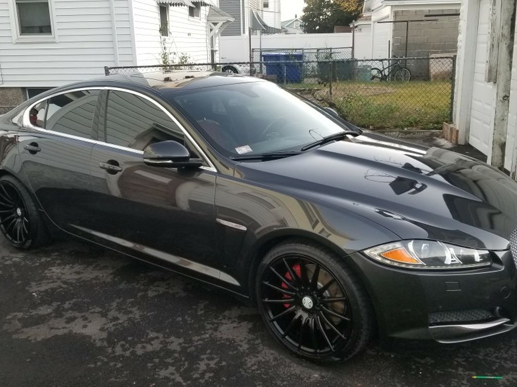 20 inch staggered black rims and tires only 1 summer use still new