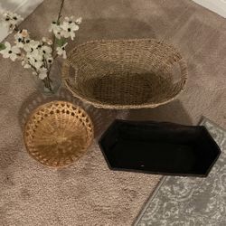 baskets and vase with flowers