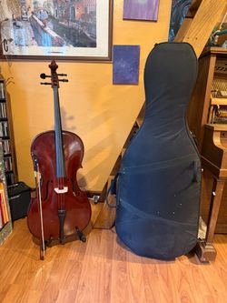 Full sized cello with hard case and bow