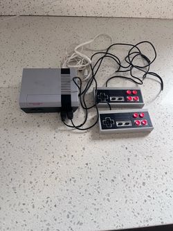 Nintendo Entertainment System (NES) Console with Two Controllers