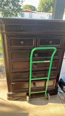 Brown tall  dresser