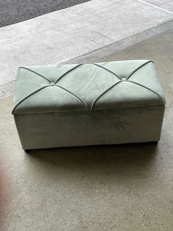 Green storage ottoman