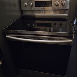 SAMSUNG STAINLESS STEEL GLASSTOP STOVE CONVECTION......$ 300