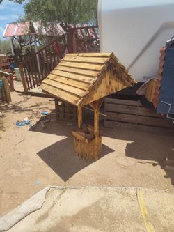 Wishing well with burnt finish