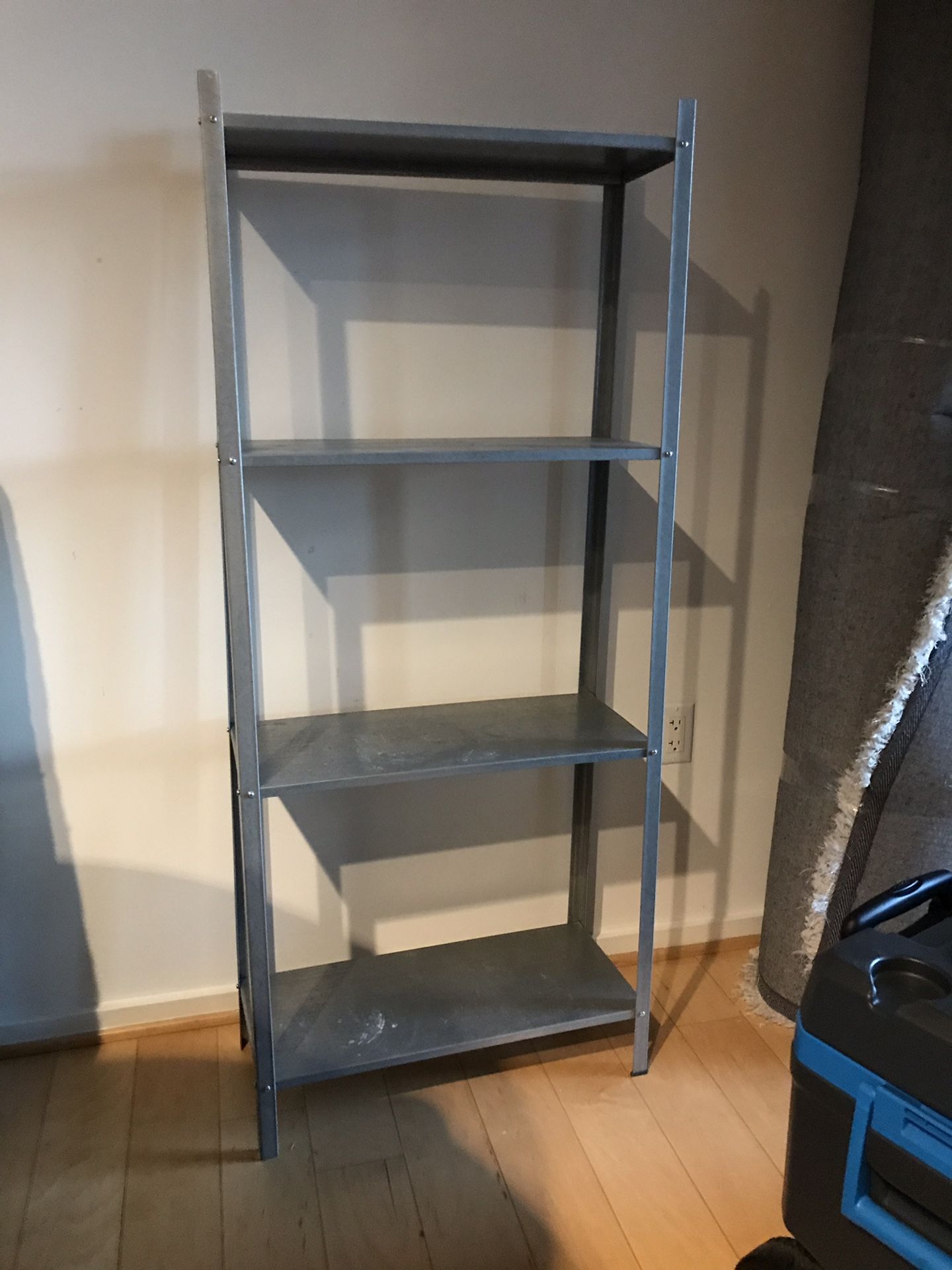 Gently used metal shelf
