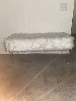 White faux fur bench