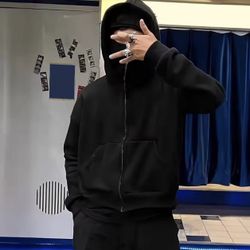 Black hoodie with a bold look #streetwear  black hoodie, oversized, streetwear, urban style, casual, minimalist, bold, pullover, blackout, sporty