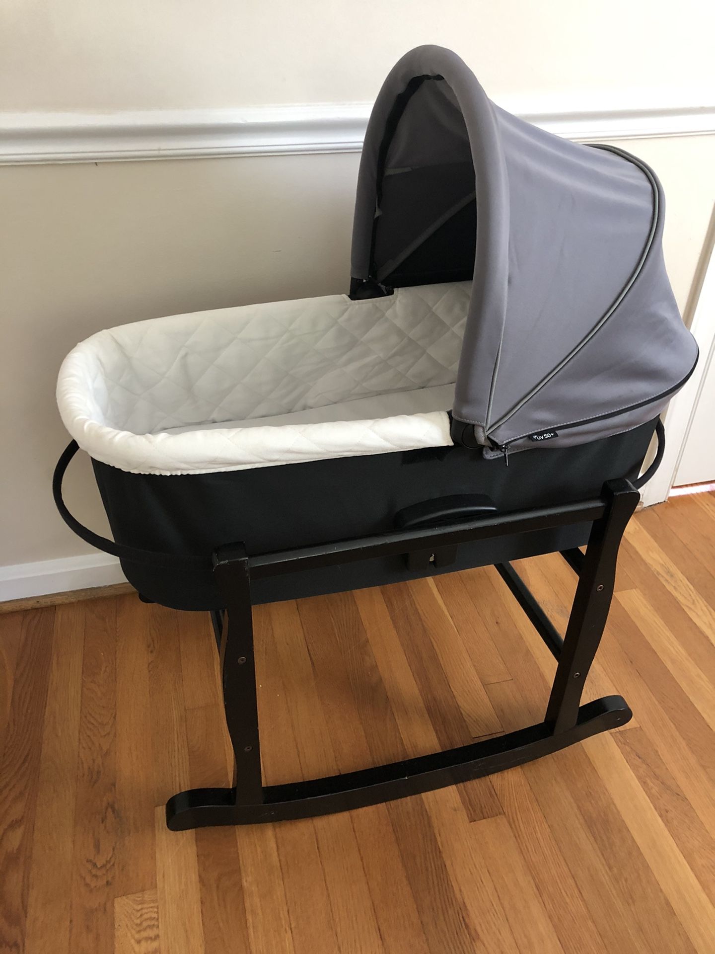 Baby Jogger bassinet and jolly jumper bassinet stand in black