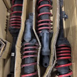 S2000 shocks with skunk2 lowering springs