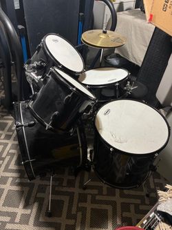 Evan’s black drum set