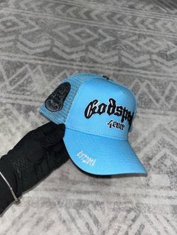 Blue Godspeed trucker cap with black embroidered
