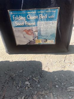 Folding guest bed