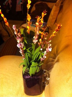 Deep purple sparkle mason jar with flowers