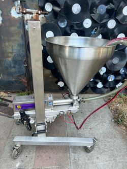 Unifiller food depository filling machine