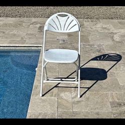 Folding white chairs .. very good shape.
