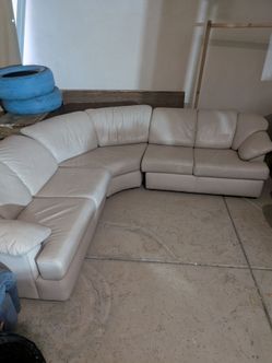 The Leather Factory Beige Couch Can Deliver $100