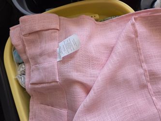 Cute baby pink curtains.