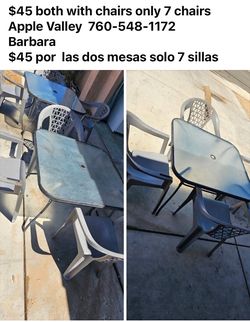 2  tables  and 7 chairs