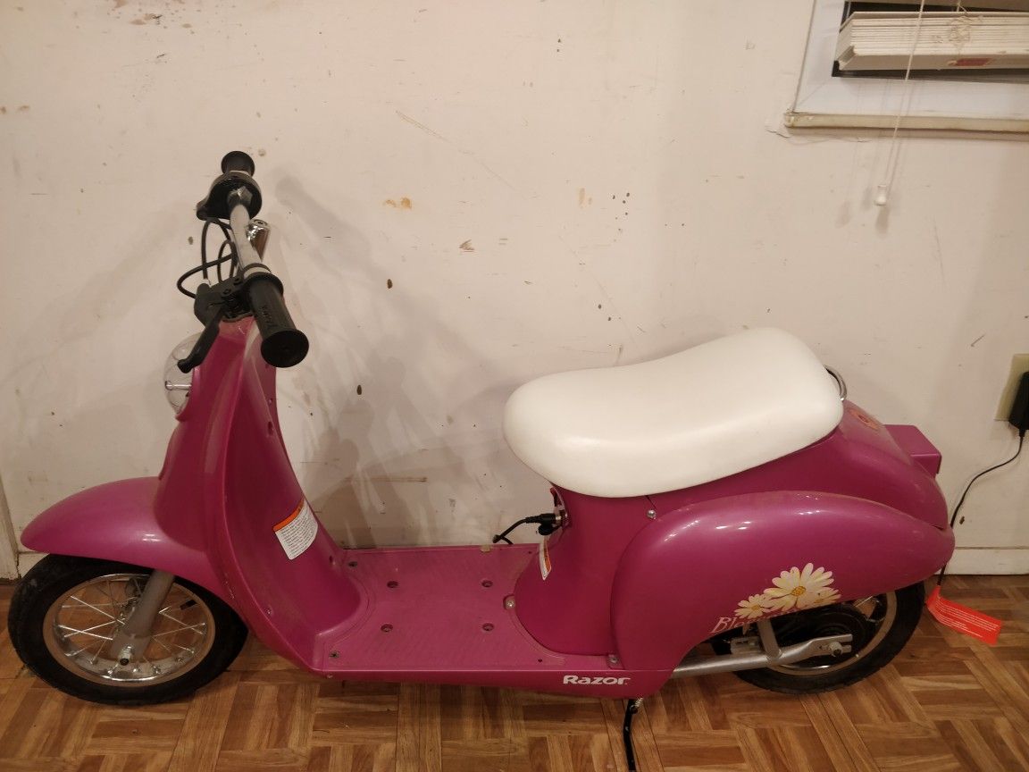Nice Blossom electric scooter with charge and storage under seat in good condition