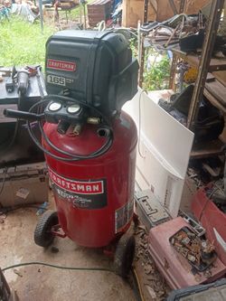 Air compressor and welding machine