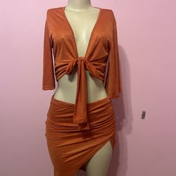 orange  crop top with matching skirt