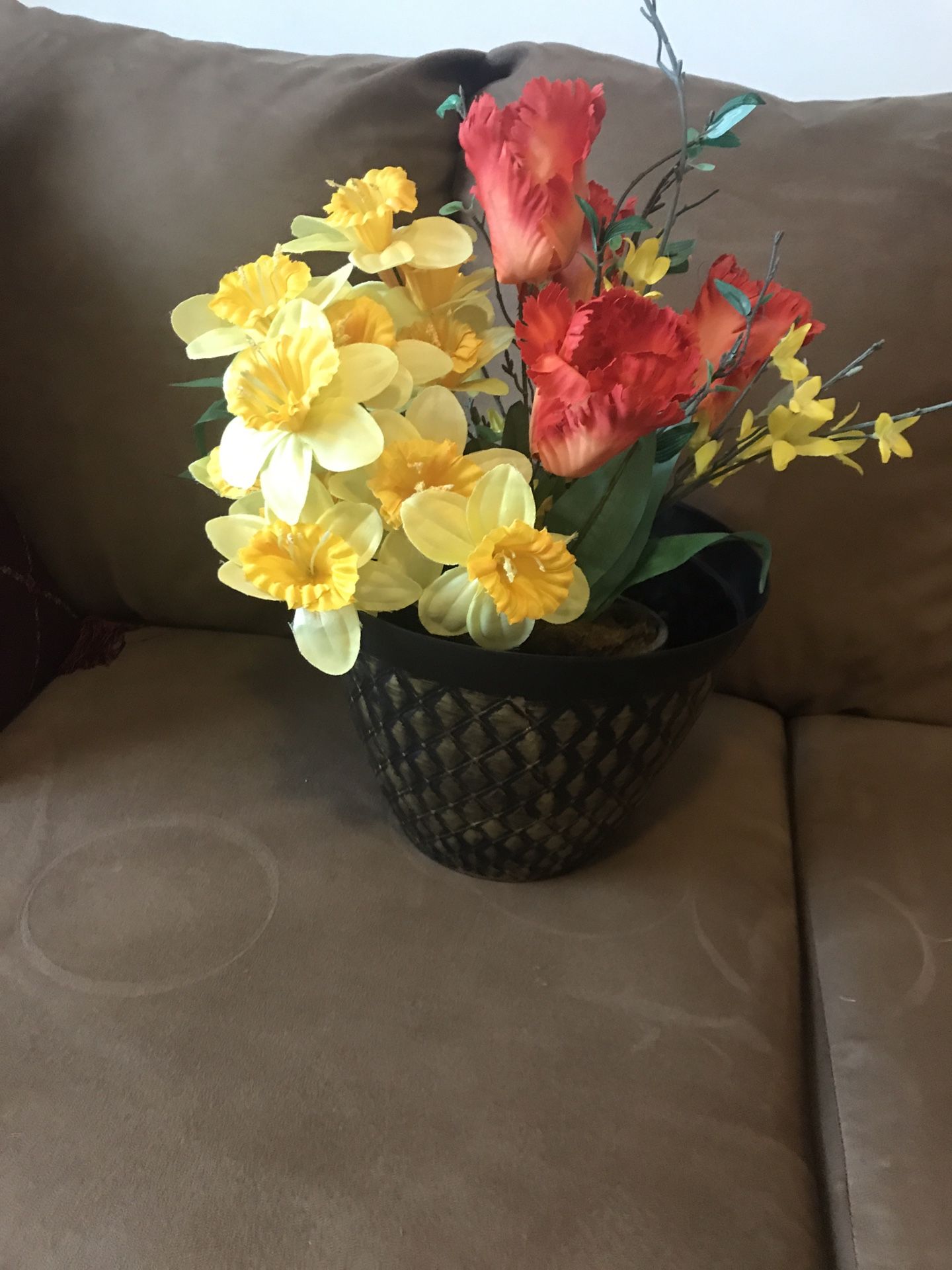 Artificial flowers in pot