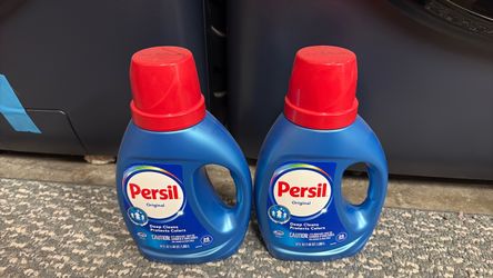 2 bottles persil laundry detergent 34 fl oz