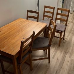 IKEA Solid Wood Dining Set – Table + 5 Chairs with Cushions