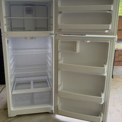White Refrigerator In Great Shape.
