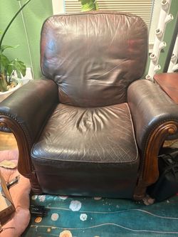 Brown Leather recliner with Wood Trim