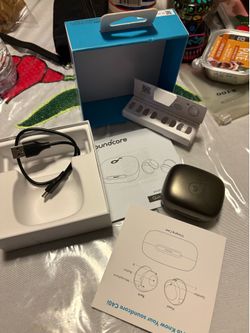 Black soundcore earphones