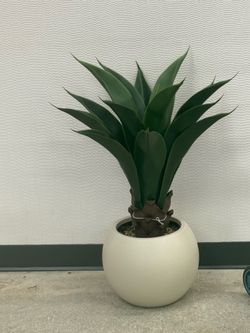 Pretty artificial plant with planter comes with removable stand ! New