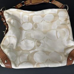 Beige And White Coach Bag With Brown Strap 