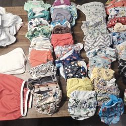 40 Cloth Diapers & inserts & hanging wet bag