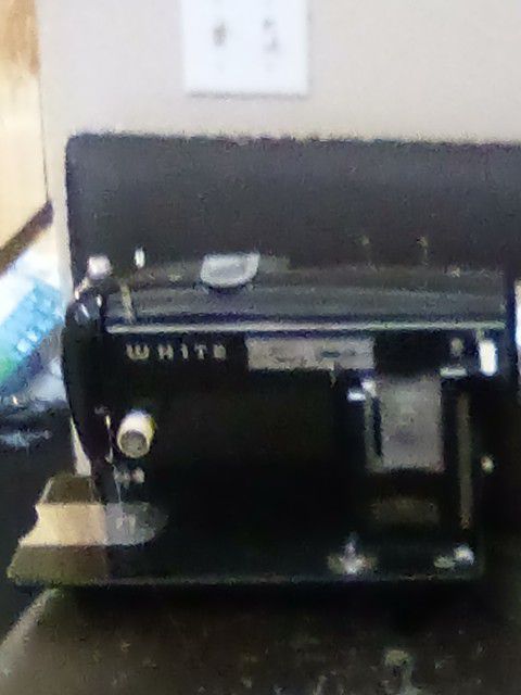 VINTAGE SEWING MACHINE WITH PEDAL MADE BY ,"WHITE"