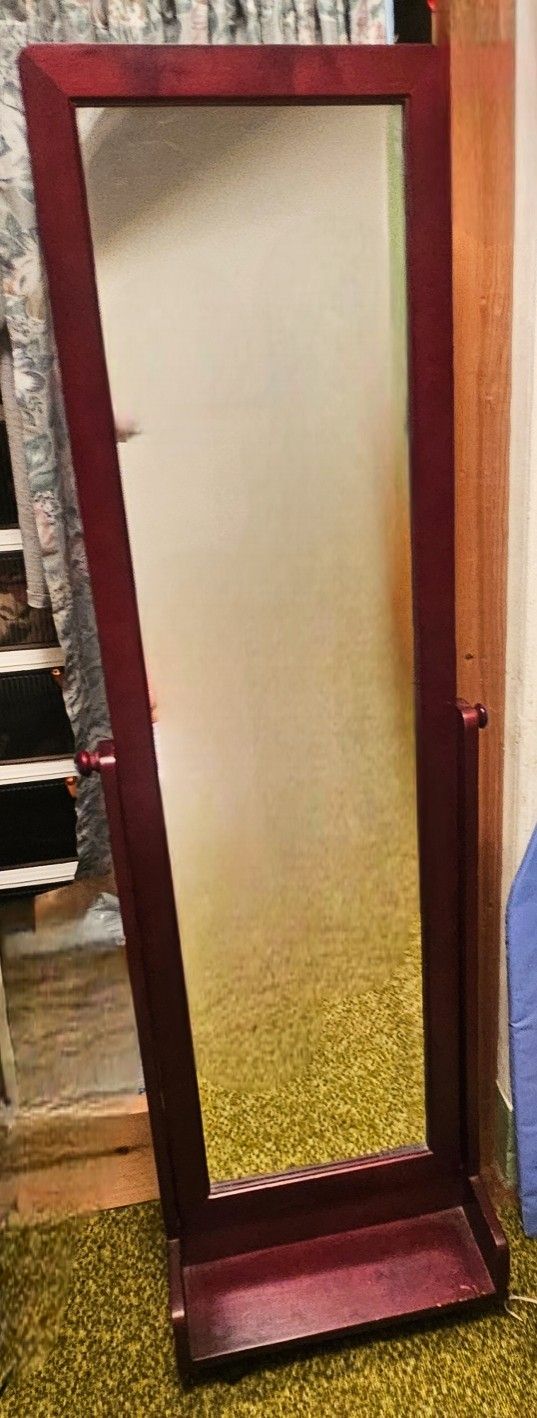 Barely used, mahogany wooden framed asjustable mirror with wheels