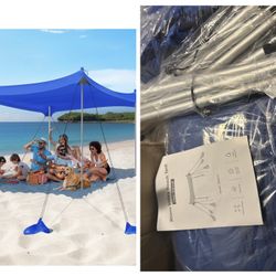 Open Box Rhino Valley Beach Tent Shade Canopy UPF50+ Protection, 8 Sandbags, 4 Stability Poles, Outdoor Sun Shelter Umbrella for Sand, Camping, Fishin