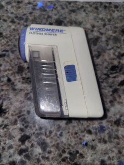 Electric fabric pill remover designed to remove lint and Fuzz