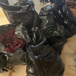 7 Big Black Bags Of Clothing 