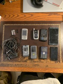 Lot of 8 Old Cell Phones with Cables