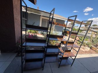 Tall brown wood shelving unit
