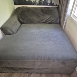 GREY SECTIONAL COUCH (LIVING SPACES)