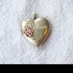 Vintage Rose Mom Locket Pendant.  Heart-shaped locket with a pink rose and engraved Mom.  Stamped 925 R.  Excellent Condition!!  Please see all pictur