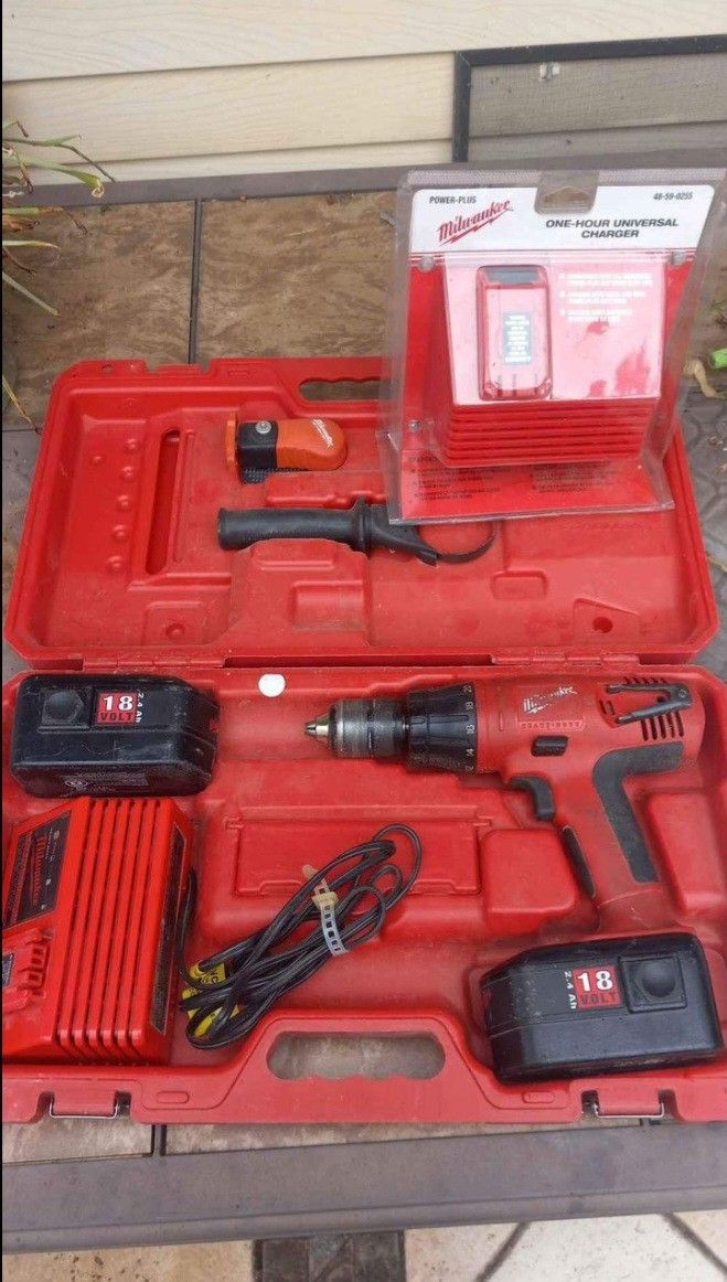 Milwaukee 18 Volt Drill, Batteries And Chargers.