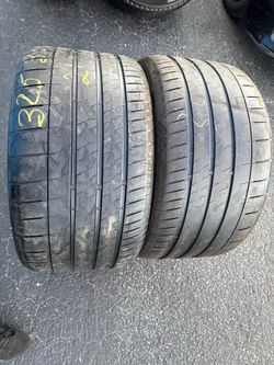 Set of 2 nice Bridgestone POTENZA 325/30/21 ( We install & balance)
